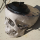 Illustration for article titled Make Your Own Animatronic Screaming Skull Brake Lights With Junkyard Parts!